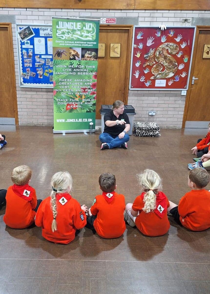 Squirrels sitting in a circle listening to a live animal handling session